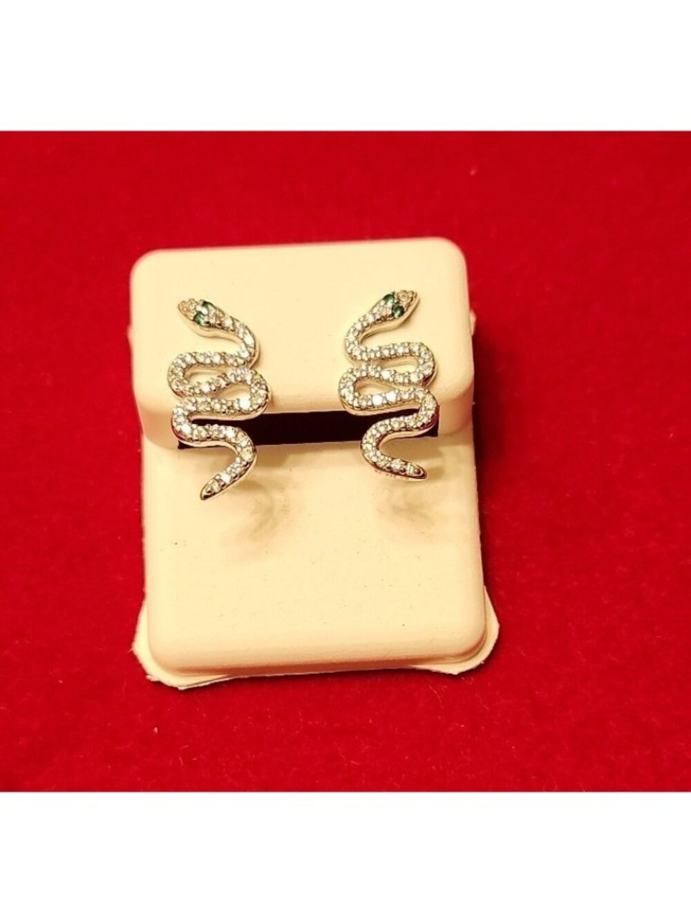 .924 fine sterling silver w rhodium snake earings